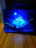Painting illuminated with UV light.